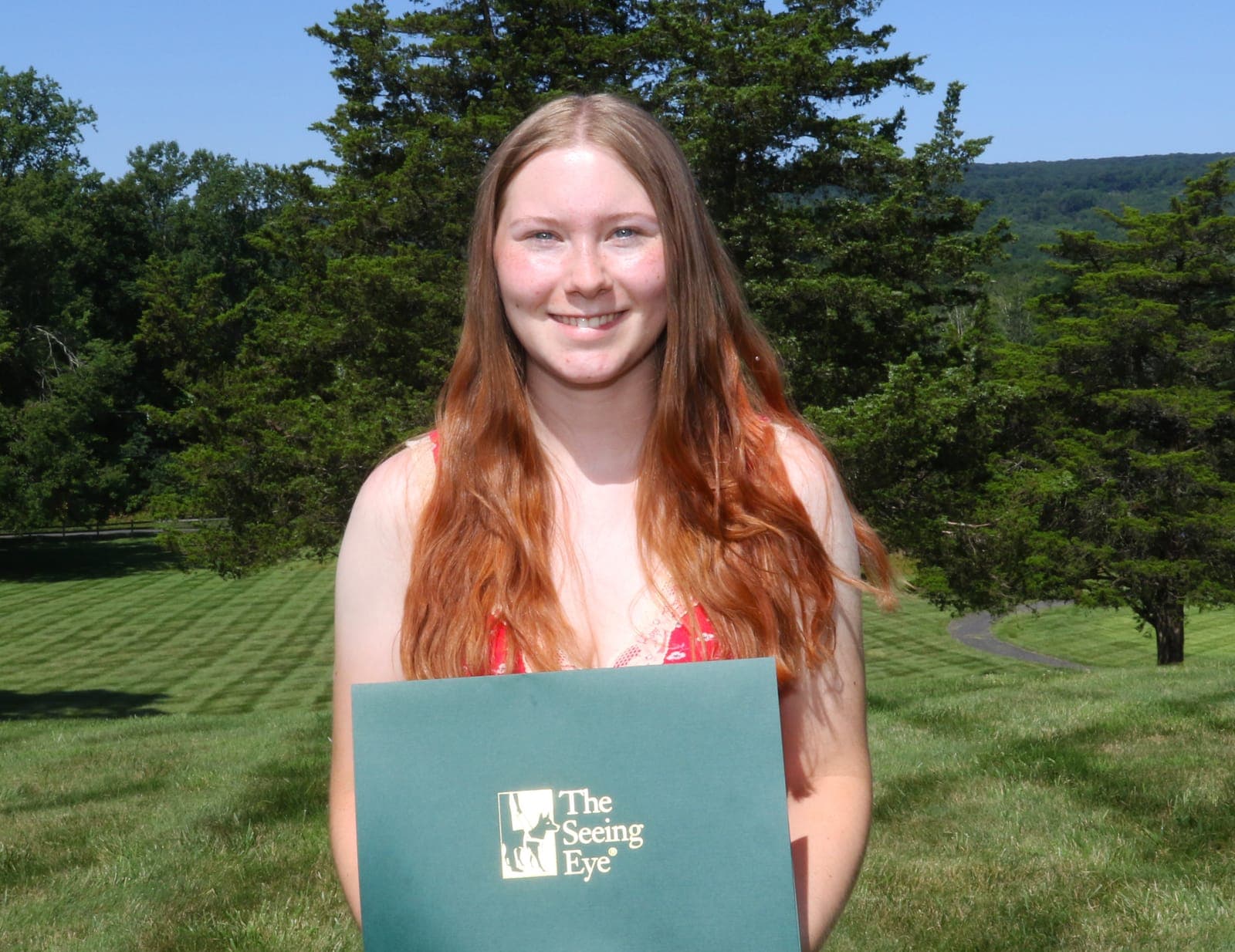 Scotch Plains resident Tess Coffey receives a scholarship from The Seeing Eye.