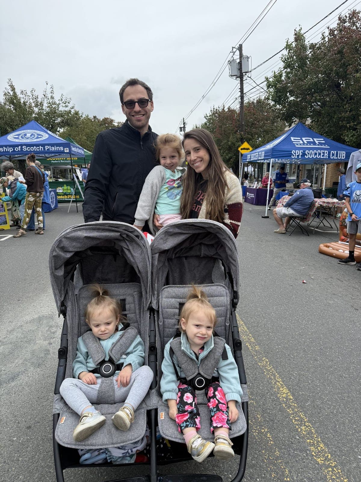 Visitors stroll Park Avenue past township and community group booths during Scotch Plains Day.