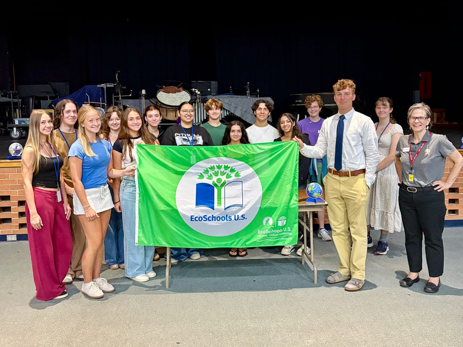 Members of SPFHS Environmental Club celebrate earning Green Flag Status through the Eco-Schools program. Pictured, from left, are Samantha Marcolina, Max Bickford, Jessie Boland, Zofia Cintron, Gwen Carberry, Rebecca Greisman, Jordin Iazzetti, Nicholas Bizzarro, Grace Azad, Enzo Primiano, Souleen Gabra, Ruth Sharlein, Jude August and Rebecca Debenham.